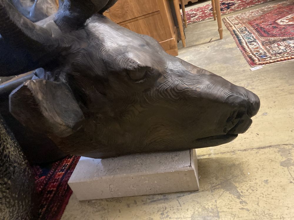 A large carved pine moose head sculpture, height 132cm